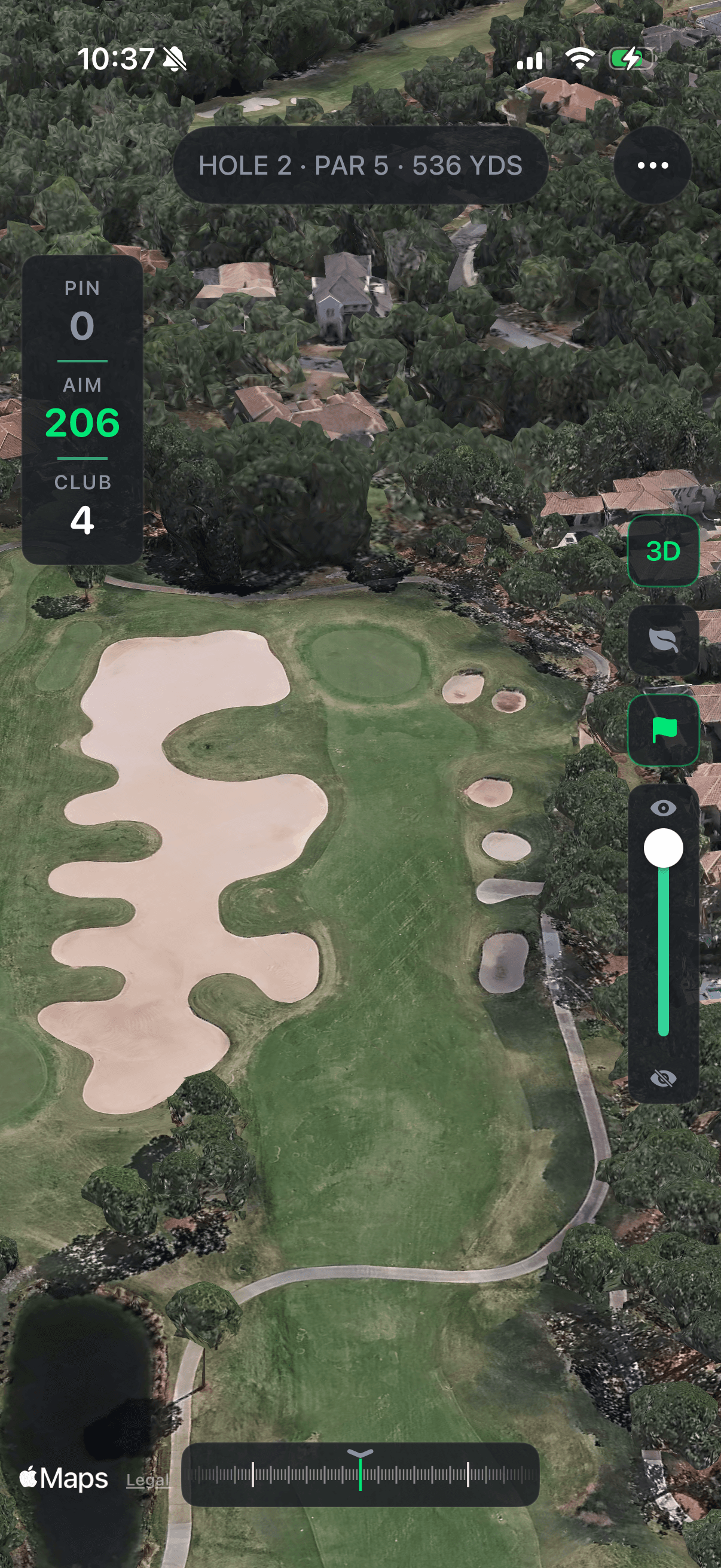 Aerial view of the same Par 5 hole on the real course — fairway, sand bunkers, and green.