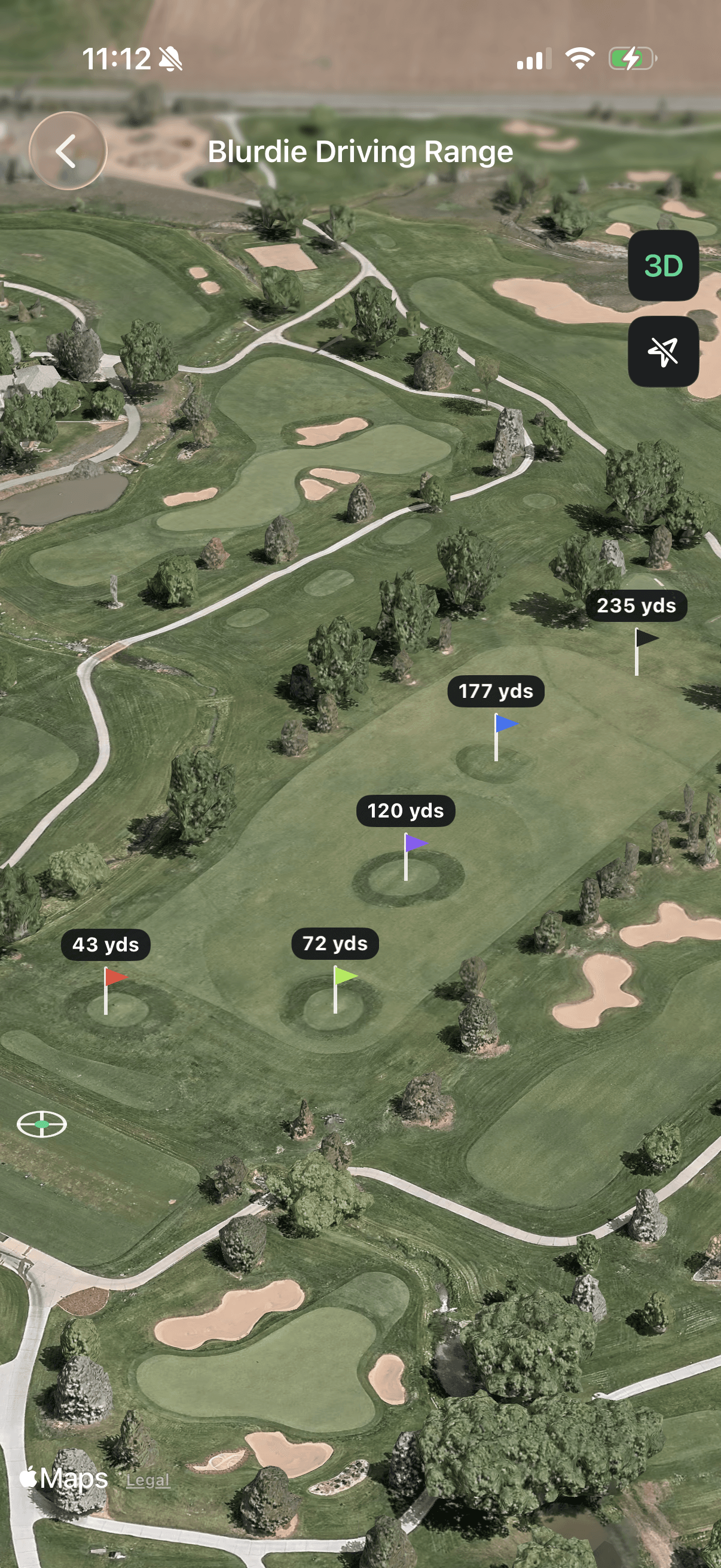 An aerial of a driving range with five colored pin flags labeled with yardages from 43 to 235.