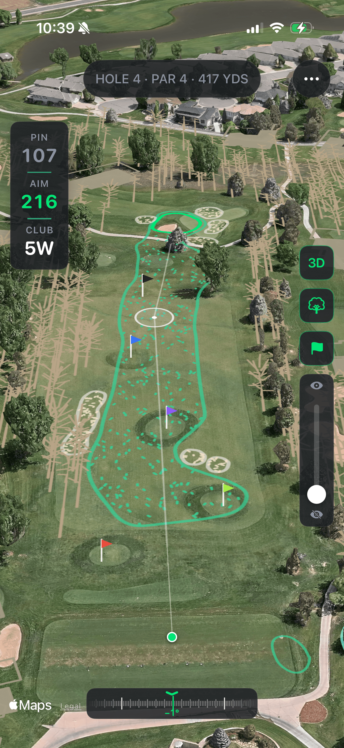 A par 4 hole projected onto a driving range, showing fairway outlines and a pin yardage card.